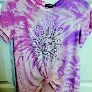 This is a purple and white tie-dye shirt that is new and has never been worn.